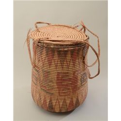 Large multi-colored woven reed basket approx.  20” in height and approx. 15” diameter with  woven ma