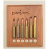Cartridge display for Dakota Arms; 7mm Dakota  - .450 Dakota; 6 total.  From the estate of  Robert P
