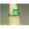 Image 1 : Stunning 14 karat yellow gold ladies custom  made ring set with a Colombian Emerald  weighing 3.35 c