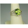 Image 2 : Dazzling 14 karat white gold ladies designer  ring set with a fine Peridot weighing approx.  6.00 ca