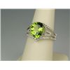 Image 3 : Dazzling 14 karat white gold ladies designer  ring set with a fine Peridot weighing approx.  6.00 ca