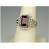 Image 1 : Dazzling 14 karat white gold ladies ring set  with an emerald cut Red Ruby weighing 2.84  carats and