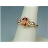 Image 2 : Gorgeous 14 karat yellow gold ladies designer  ring set with an intense orange sapphire  weighing ap