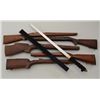 Bonanza lot of various rifle stocks and  swords.  Est.:  $75-$150.