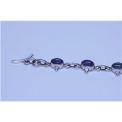 64.35 CTW TANZANITE BRACELET  .925 STERLING SILEVR
