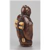 Image 2 : ,A wood netsuke of a Chinese scholar.