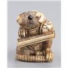 Image 2 : An ivory netsuke of a rat in gown.