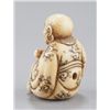 Image 3 : An ivory netsuke of Daruma.