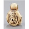 Image 4 : An ivory netsuke of Daruma.