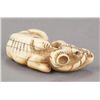 Image 2 : An ivory netsuke of a recumbent ox.