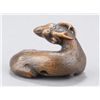 Image 3 : A wood netsuke of a recumbent goat.