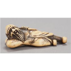 An ivory netsuke of a Dutchman.