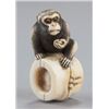 Image 1 : An ivory netsuke of a monkey.