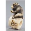 Image 2 : An ivory netsuke of a monkey.