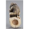 Image 3 : An ivory netsuke of a monkey.