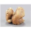 Image 3 : An ivory netsuke of two monkeys.