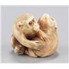 Image 4 : An ivory netsuke of two monkeys.