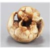 Image 5 : An ivory netsuke of two monkeys.