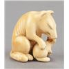 Image 2 : An ivory netsuke of a fox and her cub.
