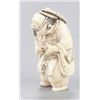 Image 2 : An ivory netsuke of a dancer.