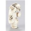 Image 4 : An ivory netsuke of a dancer.