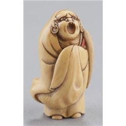 An ivory netsuke of Daruma.