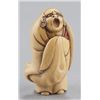 Image 1 : An ivory netsuke of Daruma.