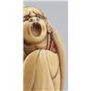 Image 2 : An ivory netsuke of Daruma.