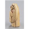 Image 6 : An ivory netsuke of Daruma.