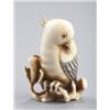 Image 1 : An ivory netsuke of a cockatoo.