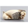Image 6 : An ivory netsuke of a cockatoo.