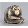 Image 1 : An ivory netsuke of a monkey.