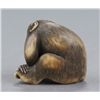 Image 4 : An ivory netsuke of a monkey.