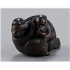 Image 5 : A wood netsuke of two monkeys.