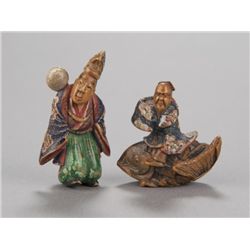 A group of two painted wood netsuke.