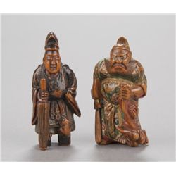 A group of two painted wood netsuke.