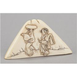 An ivory netsuke in the form of Fuji Yama.