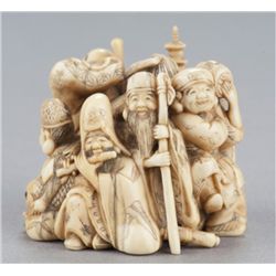 An ivory netsuke of the Seven Happy Gods.
