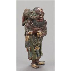 A painted wood netsuke of Ryujin, the Dragon King.