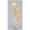 Image 7 : A group of two carved ivory netsuke.