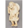Image 8 : A group of two carved ivory netsuke.