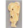 Image 9 : A group of two carved ivory netsuke.