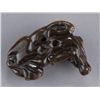 Image 6 : A wood netsuke of a recumbent ox.
