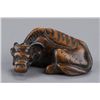 Image 5 : A wood netsuke of an ox.