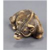 Image 2 : An ivory netsuke of a recumbent bull.