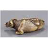 Image 3 : An ivory netsuke of a recumbent bull.