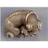 Image 7 : An ivory netsuke of a bitch and pup.