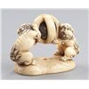 Image 4 : An ivory netsuke of a pair of Shishi.