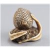 Image 4 : An ivory netsuke of a quail perched on millet seed