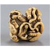 Image 5 : A ivory netsuke of a tigress and two cubs.